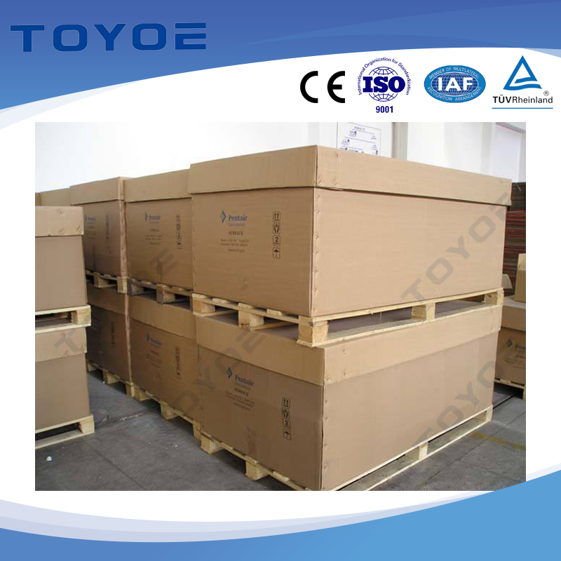 Wooden pallets stack corrugated cartons Wooden pallets stack corrugated cartons