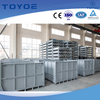 Metal racks suspend cars aerially for secure transport. 