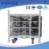 White galvanized racks with wheels for factory use.