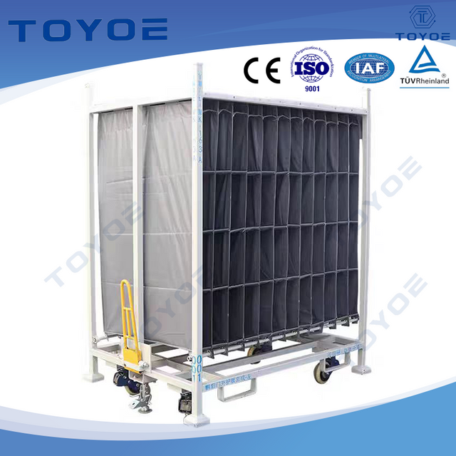 Metal racks with cloth and wheels streamline factory logistics.