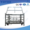 Automotive shock absorber racks are adaptable with various liners.